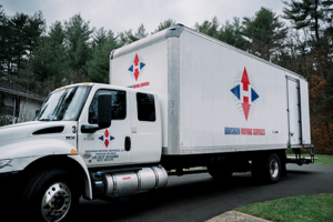 a Hingham Moving Services truck getting ready to provide international moving services