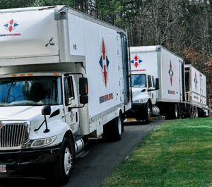 three Hingham Moving Services on location ready for a move