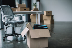 belongings packed in boxes to be added to office move checklist